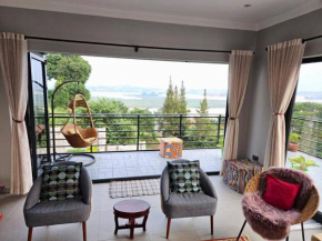 Ripple House on the Bay, hill top villa with views